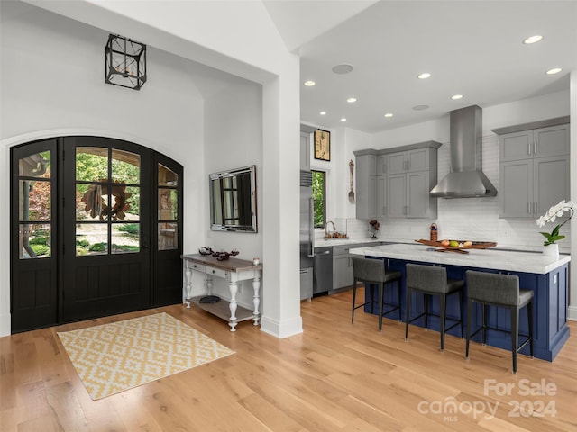 4 Windelsham Way, Arden, NC 28704 - entryway featuring sink, vaulted ceiling, and light hardwood / wood-style floors