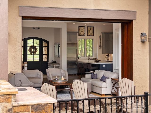 4 Windelsham Way, Arden, NC 28704 - living room featuring a textured wall and arched walkways