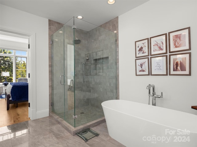4 Windelsham Way, Arden, NC 28704 - bathroom featuring independent shower and bath and wood-type flooring
