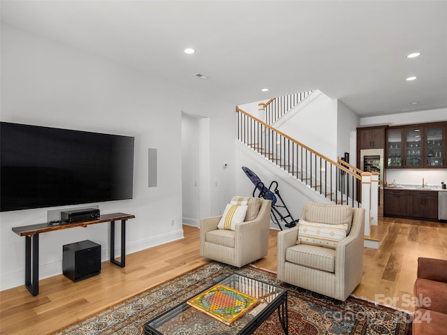 4 Windelsham Way, Arden, NC 28704 - living room with light hardwood / wood-style floors and sink