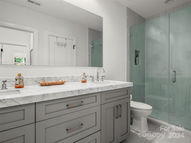 4 Windelsham Way, Arden, NC 28704 - bathroom with double vanity, a stall shower, and toilet