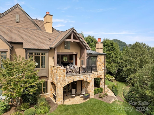 4 Windelsham Way, Arden, NC 28704 - rear view of house with a lawn and a patio