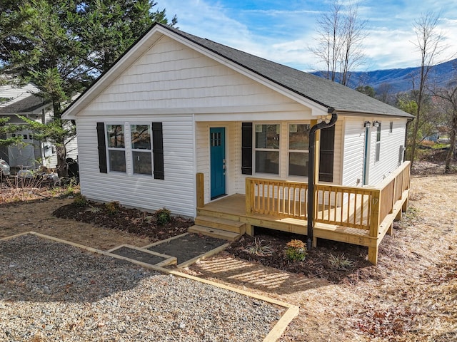 view of front of home with a mountain view