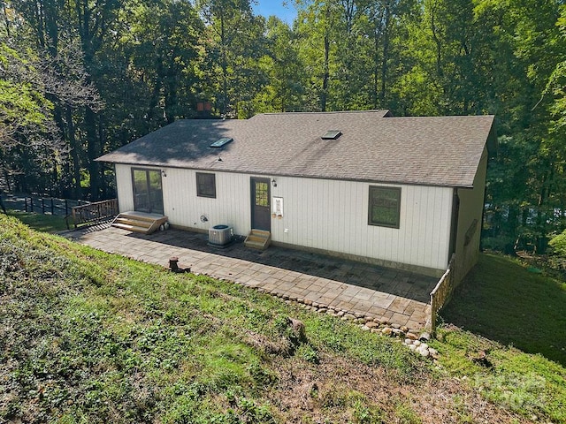 rear view of house featuring a patio