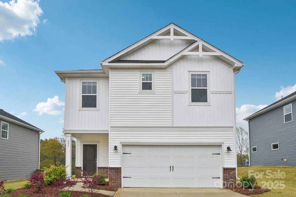 203 Alden Ct, Shelby, NC 28152 - view of front of property featuring brick siding, an attached garage, and concrete driveway