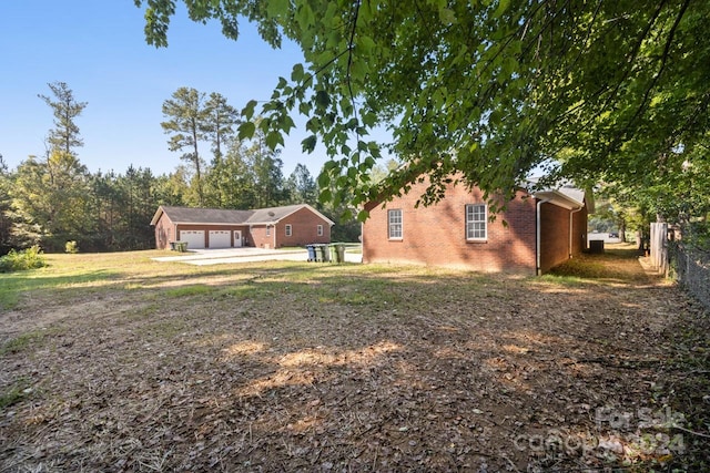 view of yard featuring a garage