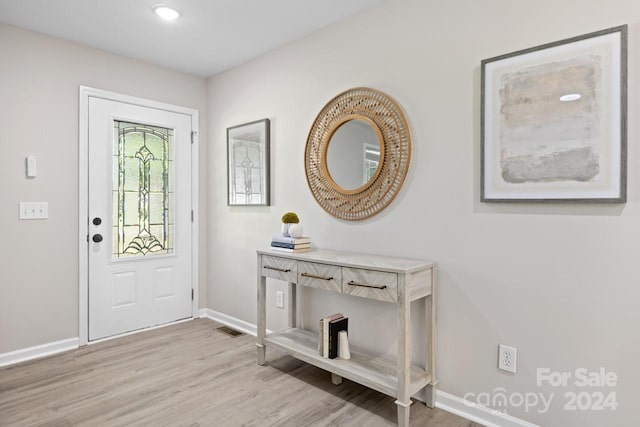 entrance foyer featuring light hardwood / wood-style flooring