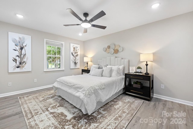 bedroom featuring ceiling fan and hardwood / wood-style floors