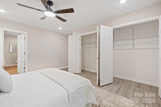 bedroom featuring light hardwood / wood-style flooring and ceiling fan