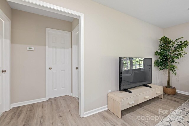 living room with light hardwood / wood-style floors