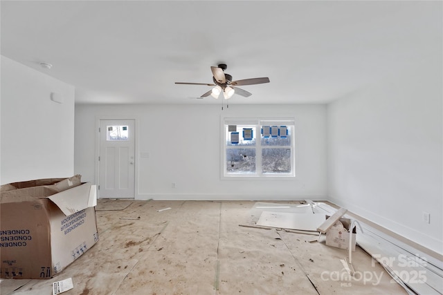 interior space featuring ceiling fan