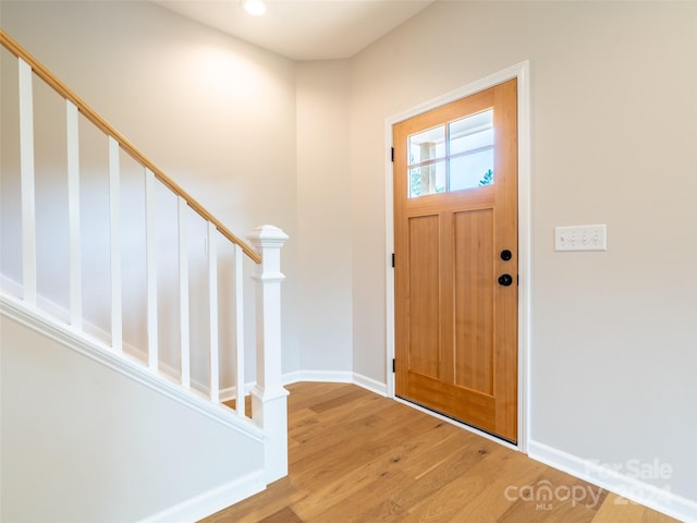 foyer with light wood-type flooring