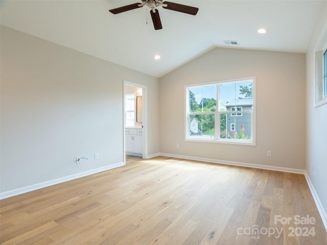 interior space with lofted ceiling, light hardwood / wood-style floors, and ceiling fan