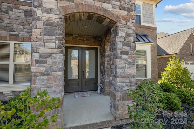 entrance to property with french doors