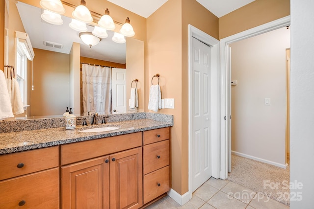 bathroom featuring vanity and tile patterned floors