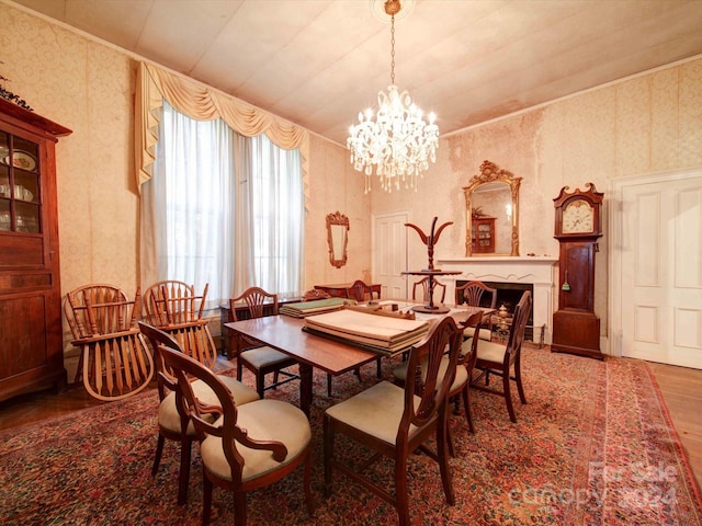 dining room with a notable chandelier and wood-type flooring