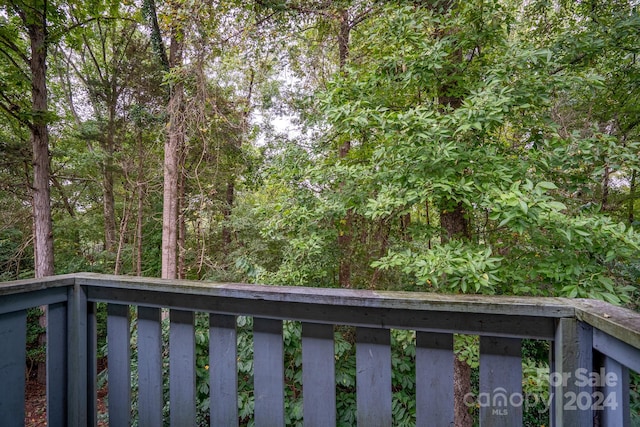 view of yard with a balcony