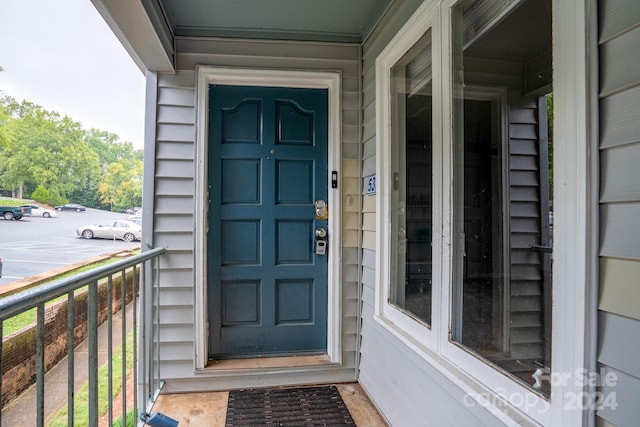 doorway to property featuring a balcony