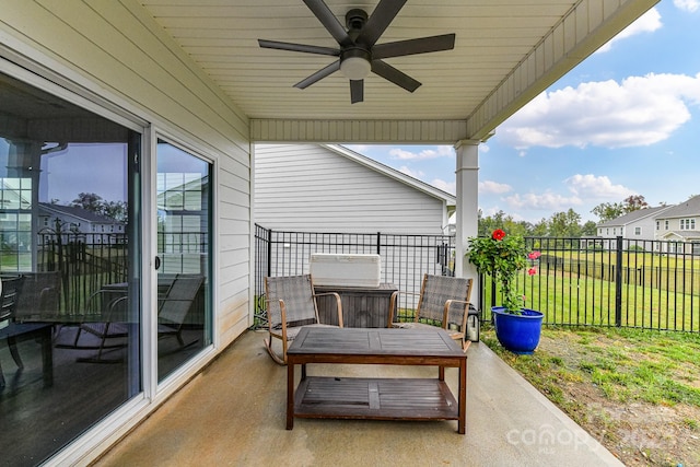 view of patio with ceiling fan