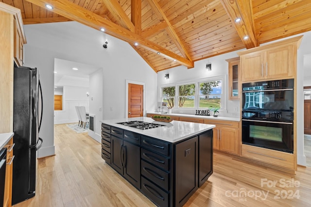 kitchen with light hardwood / wood-style floors, wooden ceiling, black appliances, a center island, and light brown cabinetry