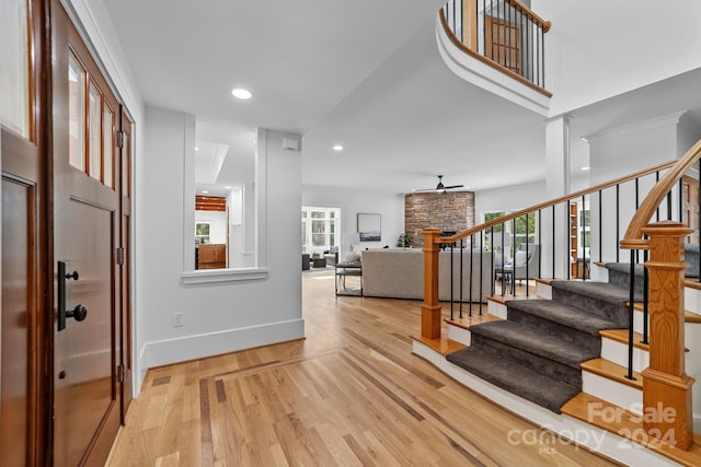 entryway with hardwood / wood-style floors