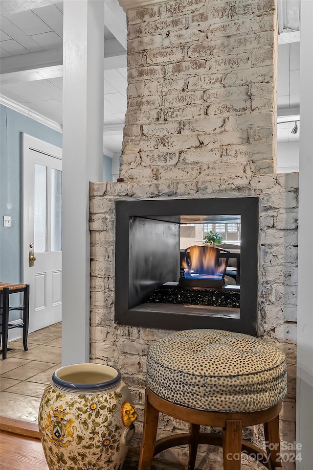 interior space with hardwood / wood-style floors and crown molding