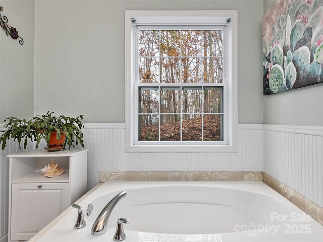 bathroom featuring a tub