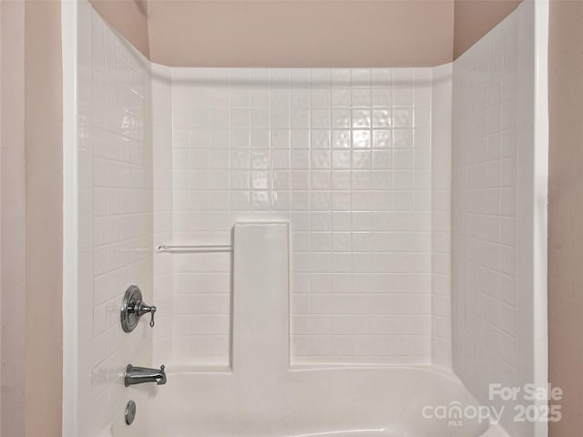 bathroom with shower / bath combination