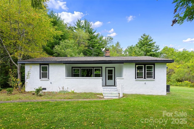 single story home with a front yard