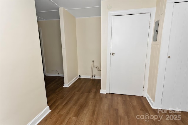 hallway featuring dark wood-type flooring