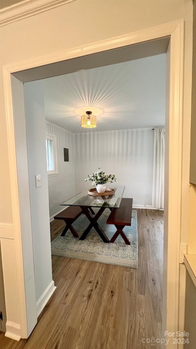 unfurnished dining area with hardwood / wood-style flooring