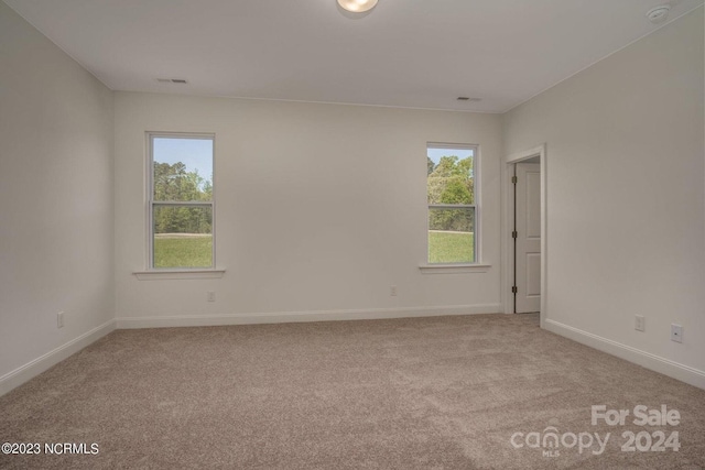 view of carpeted spare room