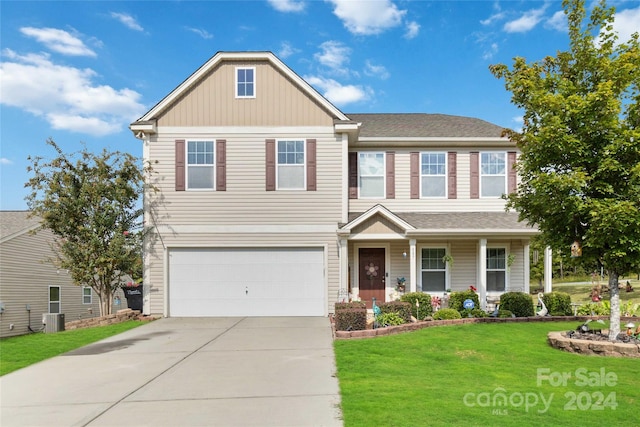 view of front of house featuring a garage, central AC unit, and a front lawn