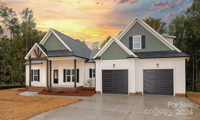 modern farmhouse featuring a garage