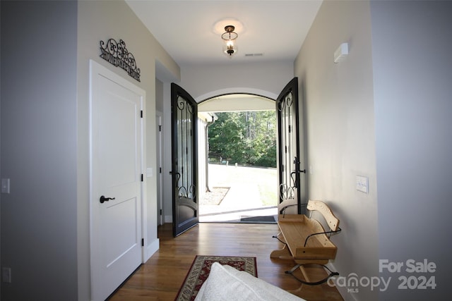 doorway featuring wood-type flooring