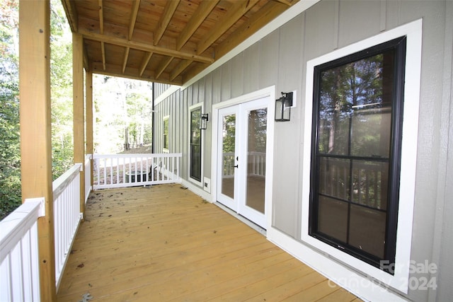 wooden terrace featuring french doors