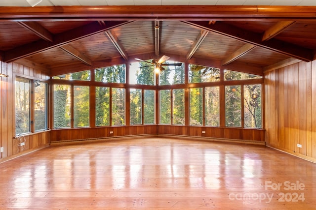 unfurnished sunroom with vaulted ceiling with beams, ceiling fan, and wooden ceiling