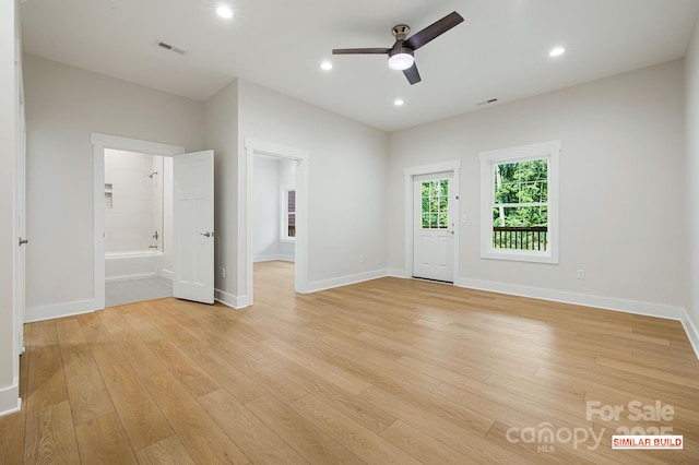 interior space with ceiling fan and light wood-type flooring