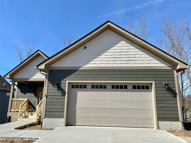 ranch-style home featuring driveway and a garage