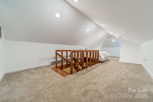 bonus room featuring carpet and lofted ceiling