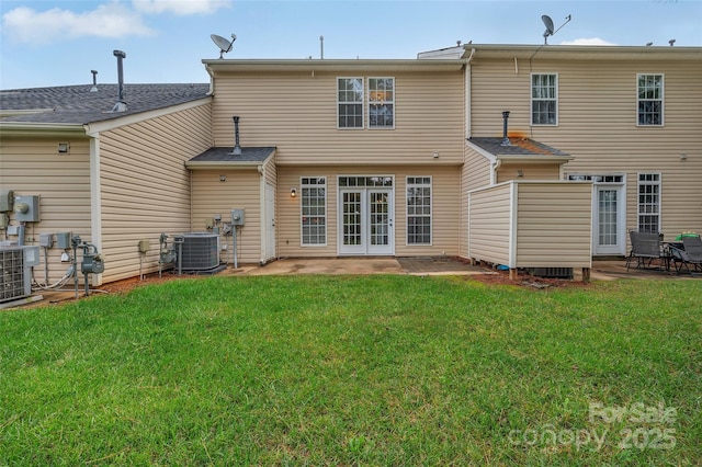 back of house with a yard, a patio, and central AC unit