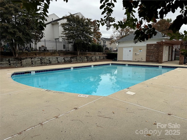 view of pool featuring a patio