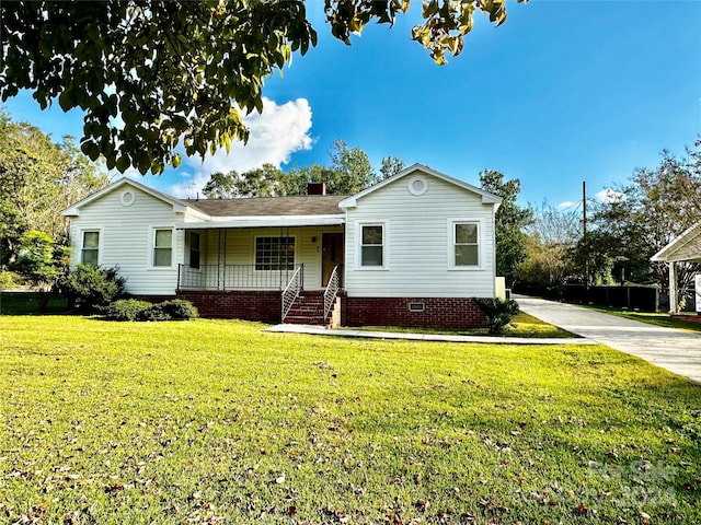 ranch-style house with a front lawn