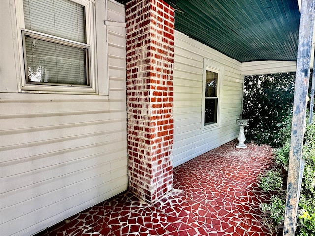 doorway to property with a porch