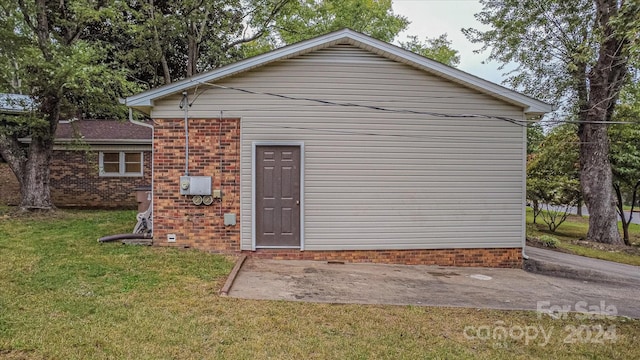 rear view of house with a yard