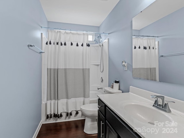 full bathroom featuring vanity, shower / bath combo, lofted ceiling, wood-type flooring, and toilet