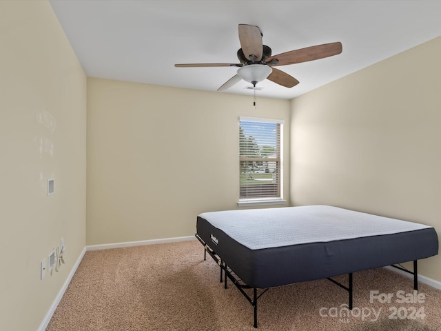 bedroom featuring carpet flooring and ceiling fan