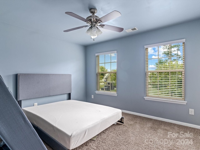 bedroom with carpet flooring and ceiling fan