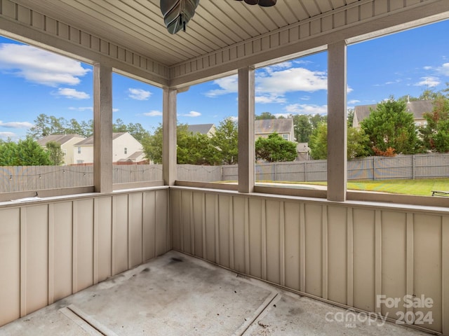 unfurnished sunroom with a healthy amount of sunlight