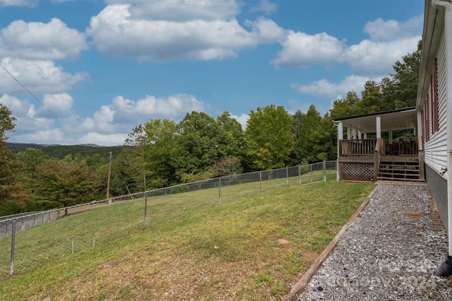 view of yard with a deck